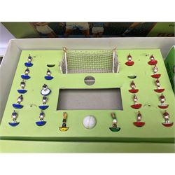Subbuteo - three boxed sets comprising Football Express with two five-a-side teams and floodlighting; Continental with four teams and accessories; and International Edition Table Rugby with two teams; together with a Real Madrid 1974-75 League Champions pennant (4)