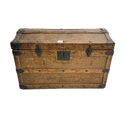 Late 19th to early 20th century oak framed travelling trunk, dome top with iron fittings and panelled sides and top, interior labelled 'The Anchor Patent Waterproof Travelling Trunk - 1902'