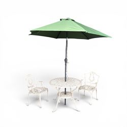 Victorian design cast aluminium garden table and twin armchairs featuring a pierced floral...