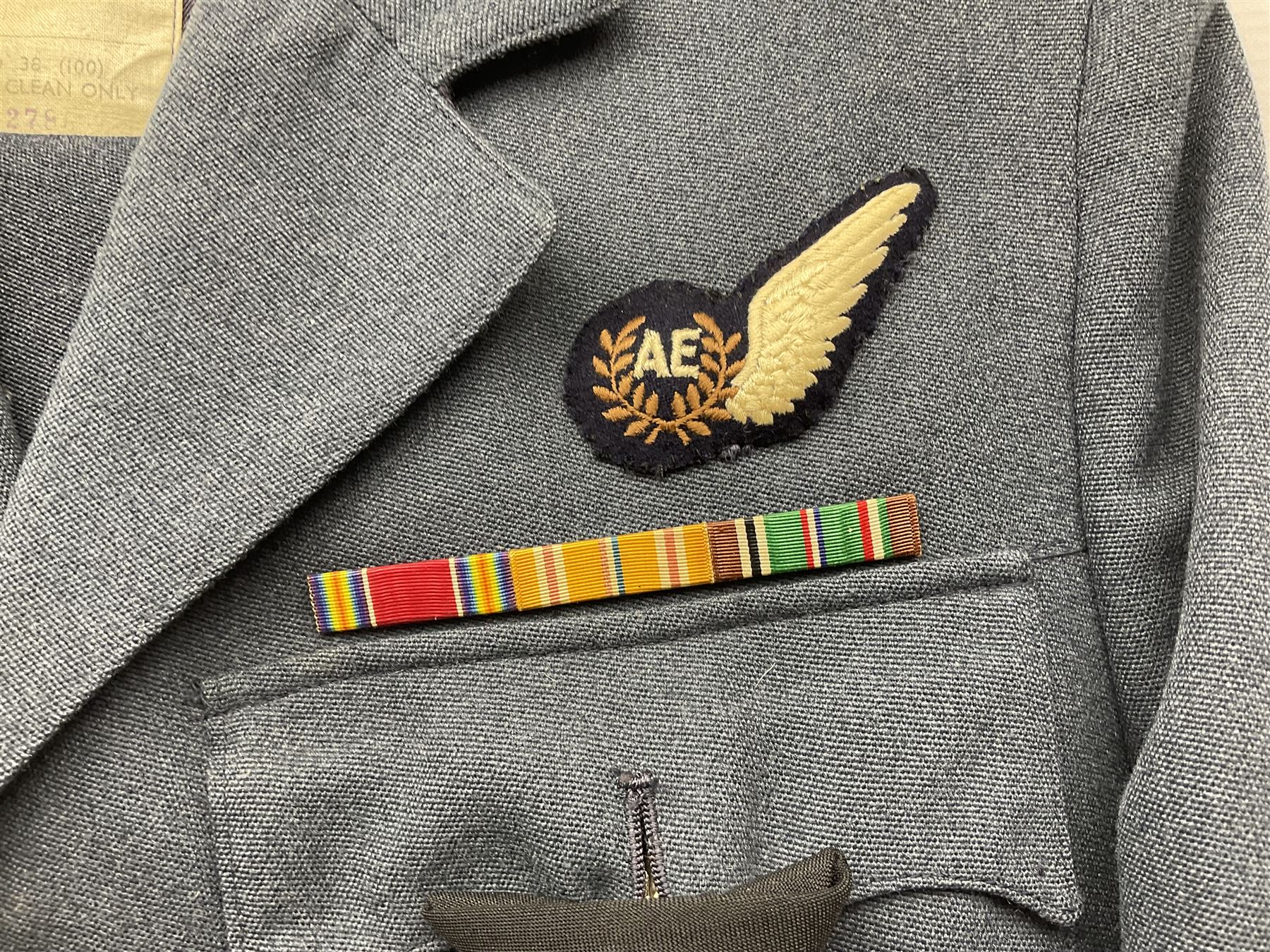 Two post-WWII British Army No.2 Dress tunics, one with Green Howards buttons; army shirt dated 1951; Royal Fleet Auxilliary jacket with trousers; three RAF/WAAF uniforms and RAF Greatcoat; and three canvas/webbing bags, two dated 1943 & 1945