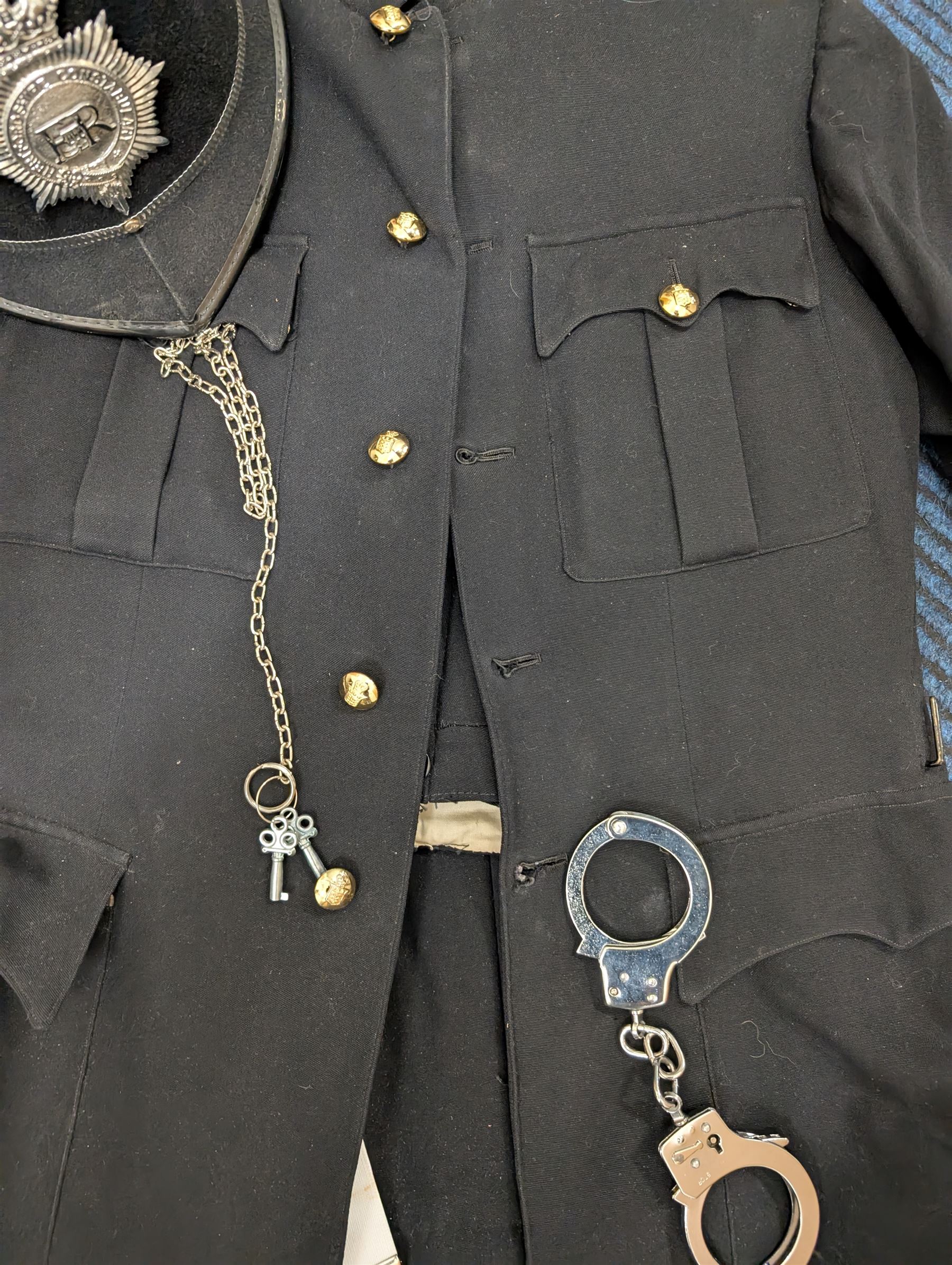 British Police Offices re-enactment uniform, including helmet, handcuffs and jacket