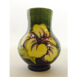  Moorcroft 'Hibiscus' pattern vase on green ground, H13.5cm  