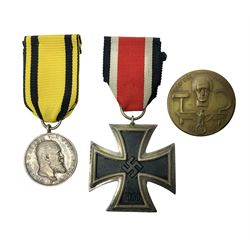 WWII German Iron Cross 2nd Class with ribbon; WWI German Wuerttemberg Medal with ribbon; and Day Badge for 1934 marked Reichsverband Pforzheim32 (3)