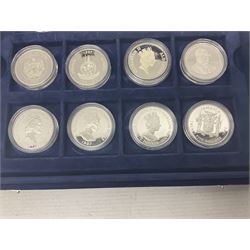 The Royal Mint Golden Wedding Anniversary silver proof coin collection, comprising twenty-four international commemorative coins, cased with certificates