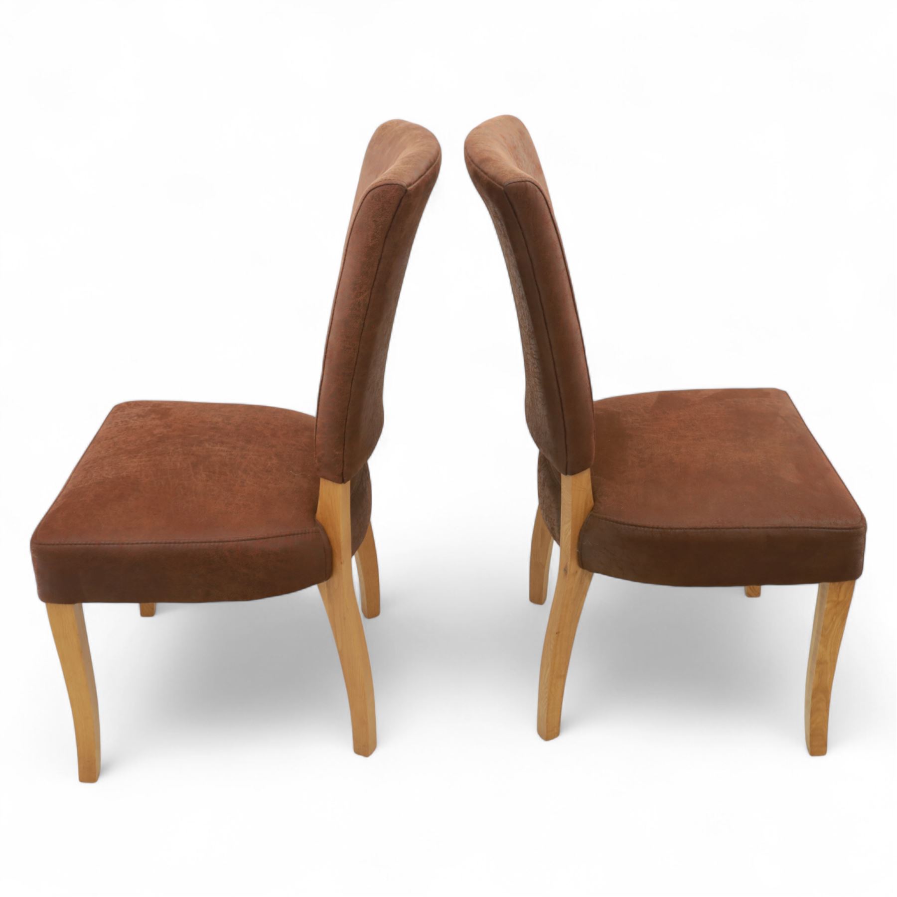 Contemporary oak dining suite, comprising rectangular table with solid top and square legs, together with four brown leather upholstered dining chairs with oak legs (5)