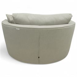 Contemporary circular snuggle chair, upholstered in taupe linen-effect fabric with fixed seat and loose back and scatter cushions, on concealed castors