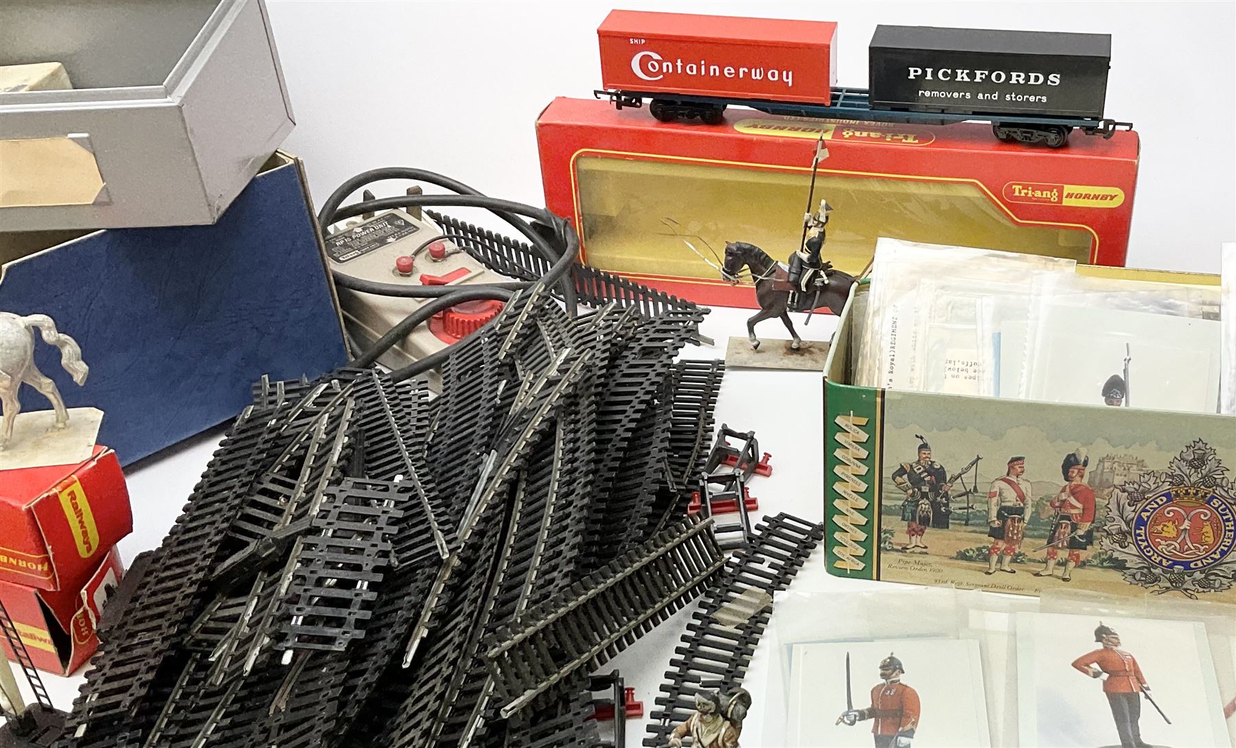 Fifty modern lead figures of mounted and foot soldiers, various period uniforms from 18th century to WW2, painted and unfinished with related paperwork; small quantity of Hornby '00' gauge model railway items and track; and four boxed Subbuteo teams etc