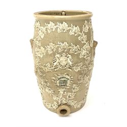 A Victorian Lipscombe & Co stoneware water filter, the body with twin scrolled lug handles, and applied fruiting vine decoration to the front, with applied maker's plaque detailed Lipscombe & Co Patentees 233 Strand Temple Bar London, H54cm. 