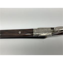 Gunmark Silver Sabel De Luxe 12-bore side by side double barrel side lock ejector sporting gun, 68.5cm barrels with 2.75cm chambers and matt bluing, walnut stock with chequered grip and fore-end and thumb safety, serial nos.12509 & 100.085, L111.5cm overall SHOTGUN CERTIFICATE REQUIRED