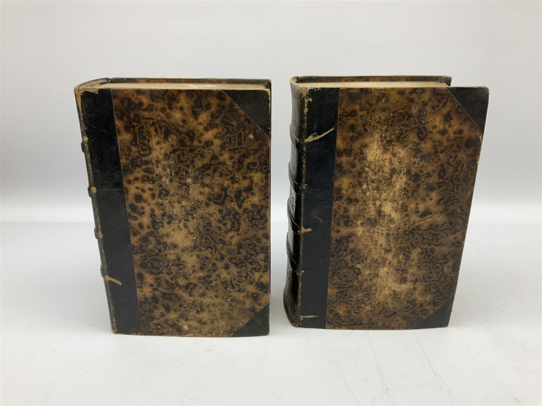 Eighteen 19th century leather bound books including Oeuvres Completes De Voltaire. 1827 Paris. Two volumes; Oeuvres De Pierre Corneille. 1892 Paris; Commentarium in Librum Geneseos Scripsit Thomas Josephus Lamy. 1883 Mechliniae; etc (18)