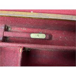 Leather shotgun case, the red baize lined interior with the trade labels of Westley Richards & Co., London, a brass plaque inscribed 'T Nevin, Mirfield, Yorkshire' to cover, with key, case to fit barrel 76cm (30 inches)  
