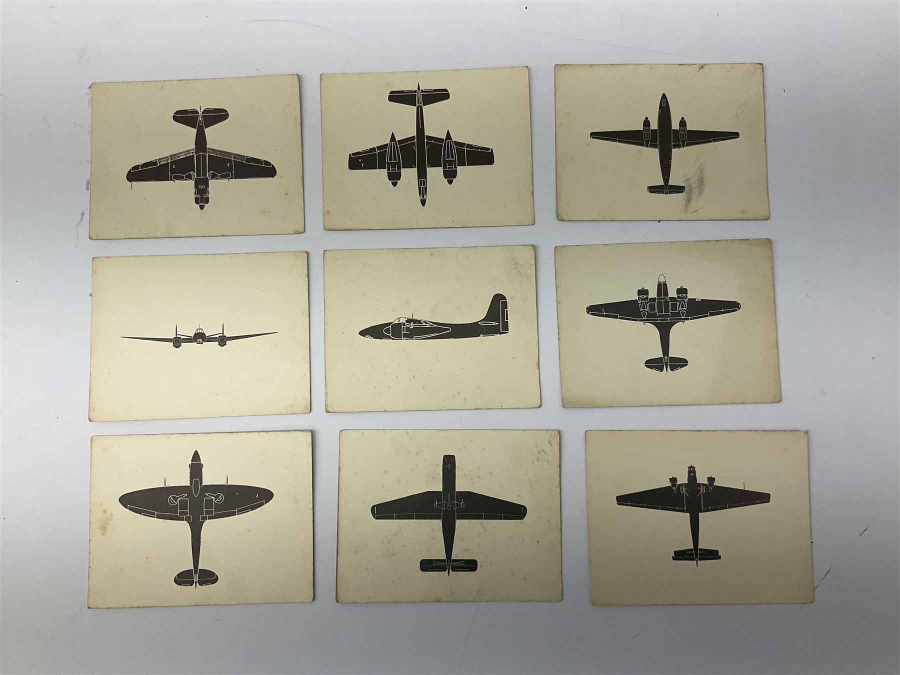 WW2 Royal Observer Corps - approximately one-hundred and seventy aircraft recognition cards; 1938 Instruction Booklet; cap badge and lapel badge; and cloth shoulder title