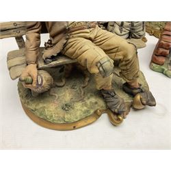 Four Capodimonte figure groups, to include tramp figures, shoemaker figure etc