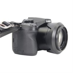 Panasonic Lumix DMC-FZ330 DSLR camera body with a Leica DC Vario-Elamrit 1:2.8/4.5-108 ASPH lens, with lens cap, hood and carry strap, in Lowepro carrycase 