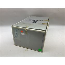 Lladro figure, Minstrel's Love, modelled as a couple entertaining, the lady in ballerina costume playing the lute and the gent stood behind her in jester type dress, sculpted by Rafael Lozano, with original box, no 5821, year issued 1991, year retired 1993, H31cm