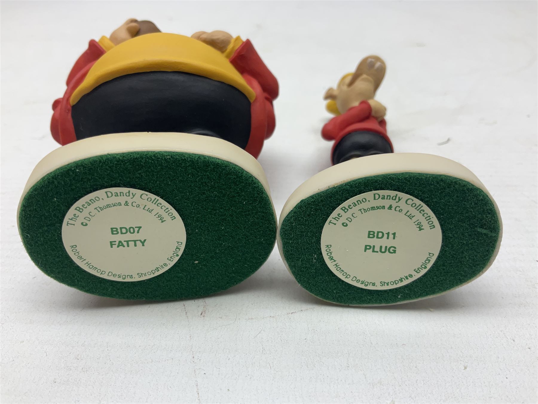 Thirteen Robert Harrop figures from the Beano Dandy collection, comprising Yo-Yo Collectors Piece 1996, Desperate Dan BD03, Cuthbert Cringeworthy BD08, Teach BD06, 'Erbert BD14, Toots BD12, Winston BD17, Fatty BD07, Dennis The Menace BD01, Dennis the Menace Fishing BD806, Sydney BD13, Wilfrid BD15 and Plug BD11