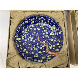 Three Chinese polychrome enamel plates each decorated with floral decoration, all marked beneath, D21cm 