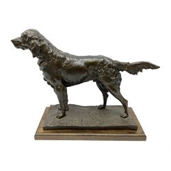 Bronzed figure of a hunting dog raised upon a stepped oak base, H38cm, L50cm