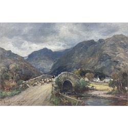 Owen Bowen (Staithes Group 1873-1967): Sheep Crossing a Stone Bridge in the Lake District, oil on canvas signed and dated '07, 39cm x 60cm
