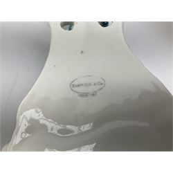 Victorian wall pocket by Moore Brothers retailed by T.Goode modelled as a semi nude white glaze cherub with turquoise ribbon, with encrusted floral decoration, the reverse stamped ‘T.Goode & Co.’, H32cm