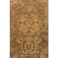  Large Persian design carpet, field decorated with swirled foliage, central medallion, repeating guarded border, 407cm x 318cm  