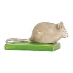Pair of rare early 19th century Staffordshire pottery figures, circa 1820, modelled as mice resting upon green rectangular bases, H3.5cm L9cm

Footnote: Figures such as these are very rare, few examples have survived and are thought to have been played with as toys
