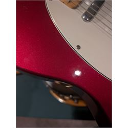 Fender Telecaster electric guitar, serial no. T021384 made in Japan c.1994, with Candy Apple Red body, white scratch plate and maple neck, guitar L98cm