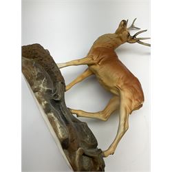 A Beswick Connoisseur matt model of a Stag upon a rocky modelled base, 2629