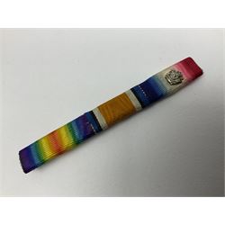 WW1 group of three medals comprising British War Medal, Victory Medal and 1914 Star awarded to 8328 Pte. G. Shaw Yorks: L.I.; on hanging bar with WW2 1939-1945 War Medal and WW1 ribbon bar with rosette to 1914 Star ; all with ribbons; and WW2 1939-1945 War Medal with ribbon