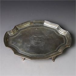 Victorian silver teapot stand, with chippendale style rim and engraved crest to centre, up...