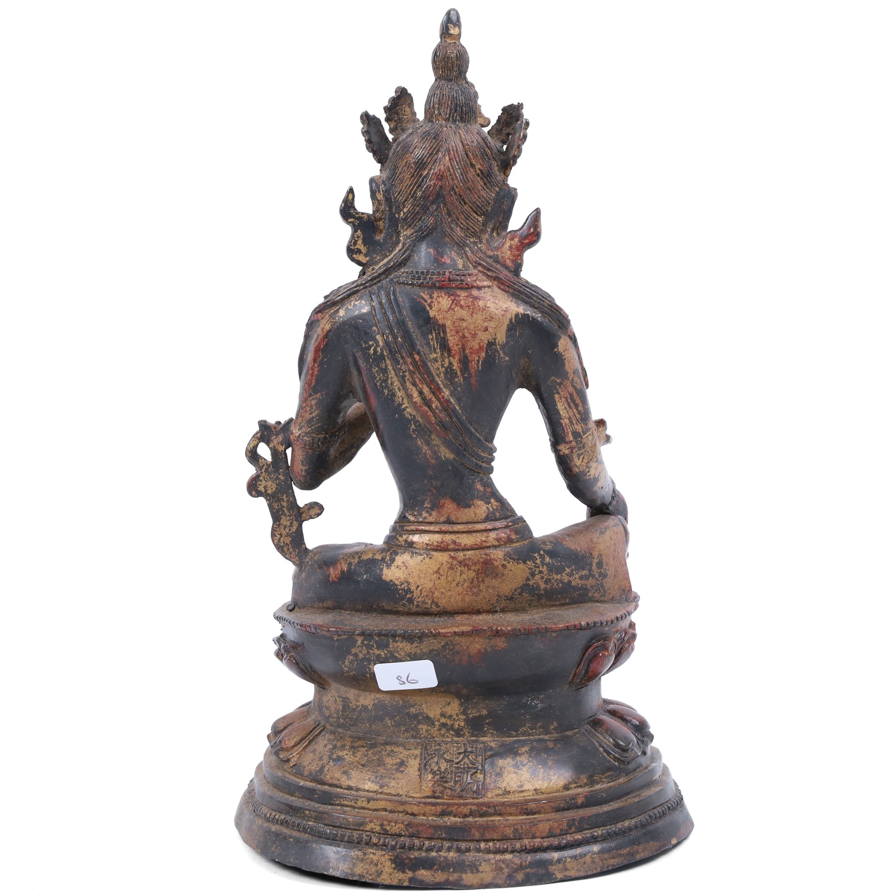 20th century bronzed buddha, with one hand raised, seated upon a lotus leaf, H27cm