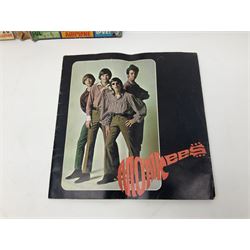 Monkees memorabilia - 'Monkees Monthly' magazine almost complete run from No.1 Feb 67 to No.31 Aug 69 (lacking nos.29 and 32); the cover of No.1 signed by all four members of the group during their 1997 Reunion Tour; quantity of A&BC bubble gum cards; programme for their only UK live performance in 1967 at Empire Pool Wembley; and other related late 1960s music magazines/paperback book
