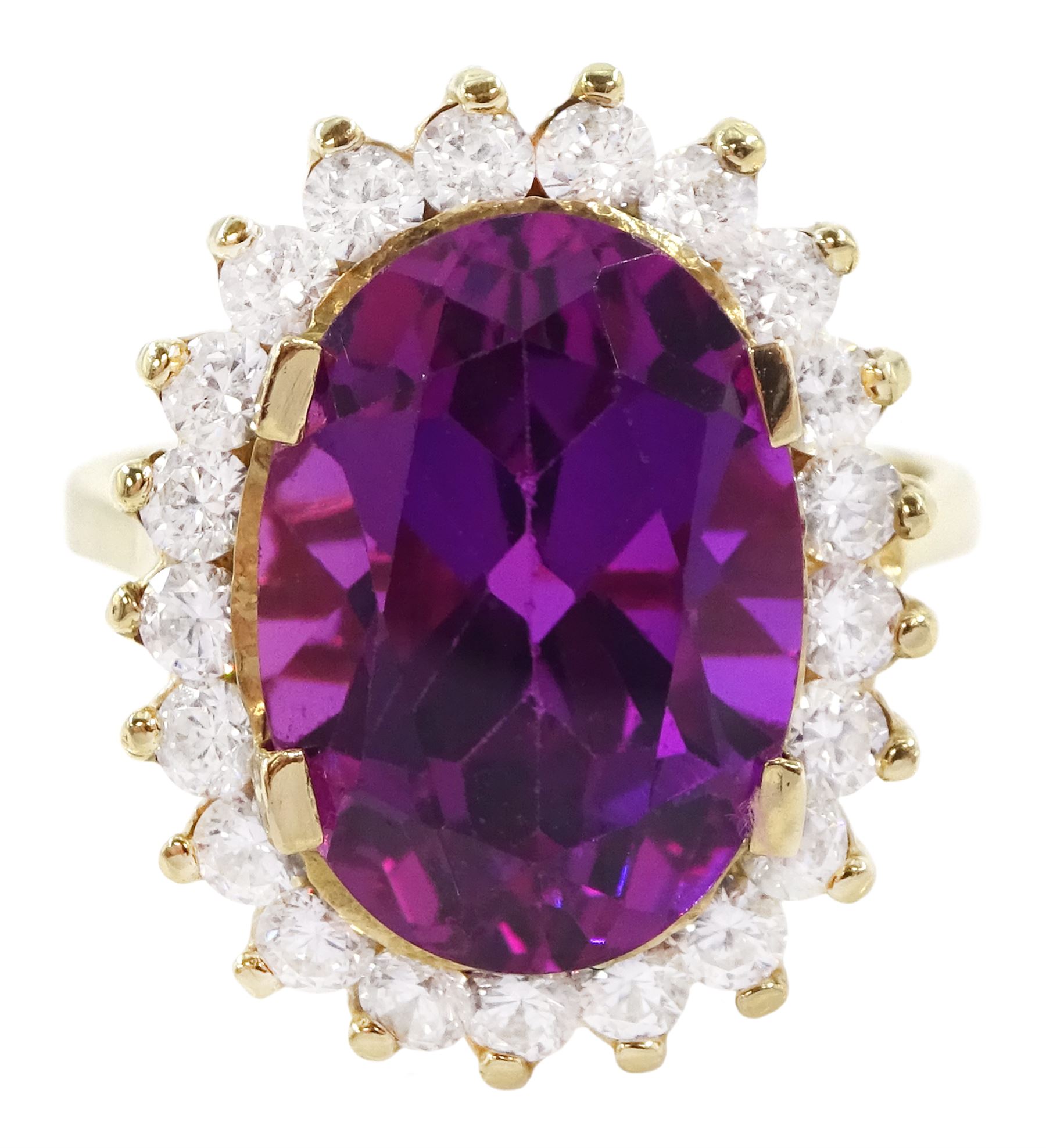 14ct gold synthetic purple sapphire and cubic zirconia cluster ring, stamped 14K