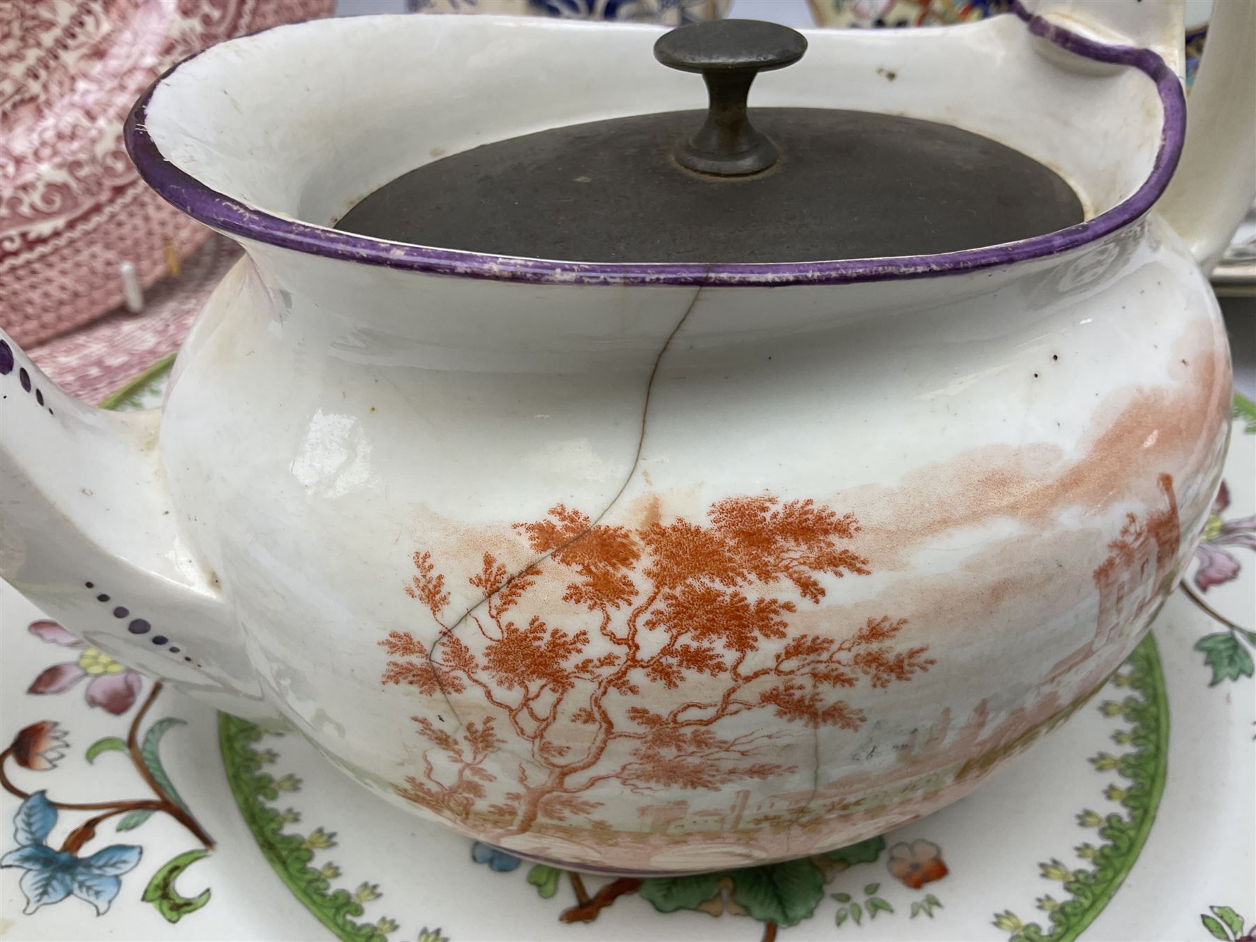 Four mid 19th century Mason's Ironstone plates decorated in the Chinese Antiquities pattern, the central circular panel decorated with footed vase with stylised motifs within a floral border, with gilt detail, pattern no. 1438, largest D26cm, together with Royal Worcester plate with floral decoration within green borders, blue and white tankard with pewter lid and teapot, teapot
