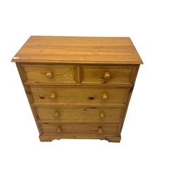 Solid waxed pine chest, fitted with two short and thee long drawers on plinth base
