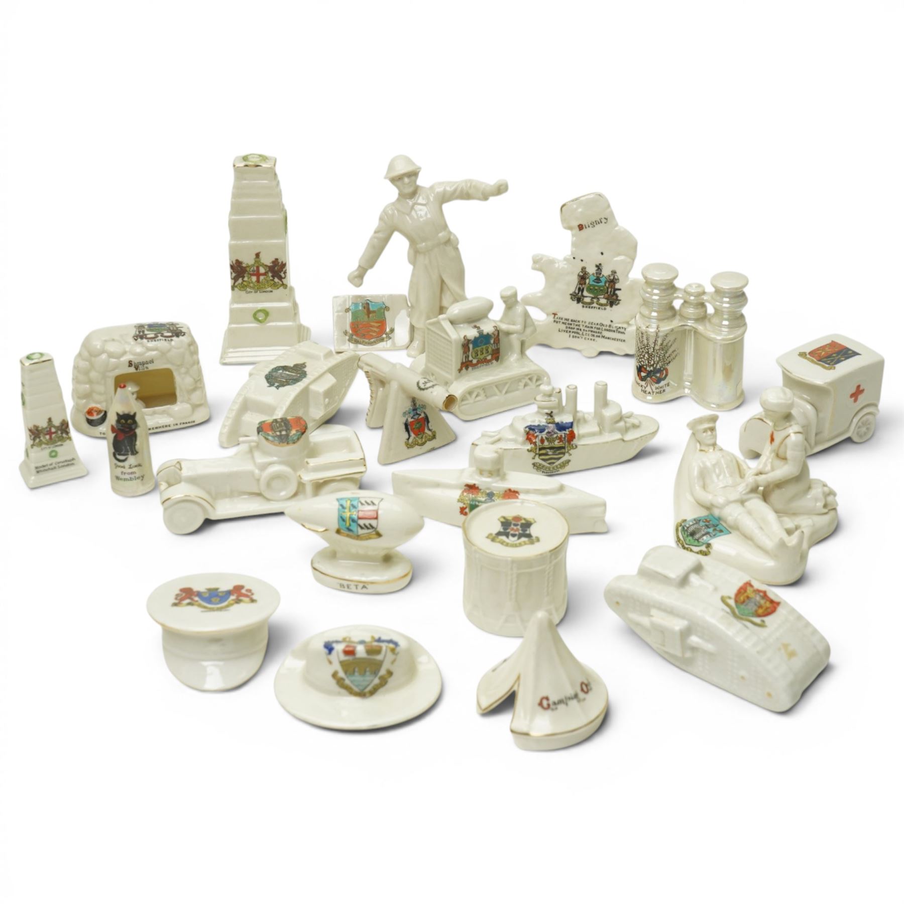 WW1 crested china including Grafton 'The Bomb thrower', Swan 'Nurse & Wounded Tommy', Model of Motor Tractor used on Western Front', two tanks, ambulance, Cenotaph etc