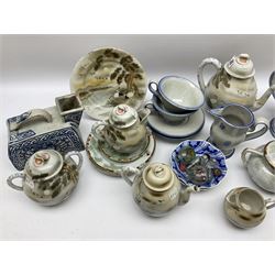 Oriental ceramics, including teapot, jugs, two tea cups and saucers, tea wares decorated with cranes etc