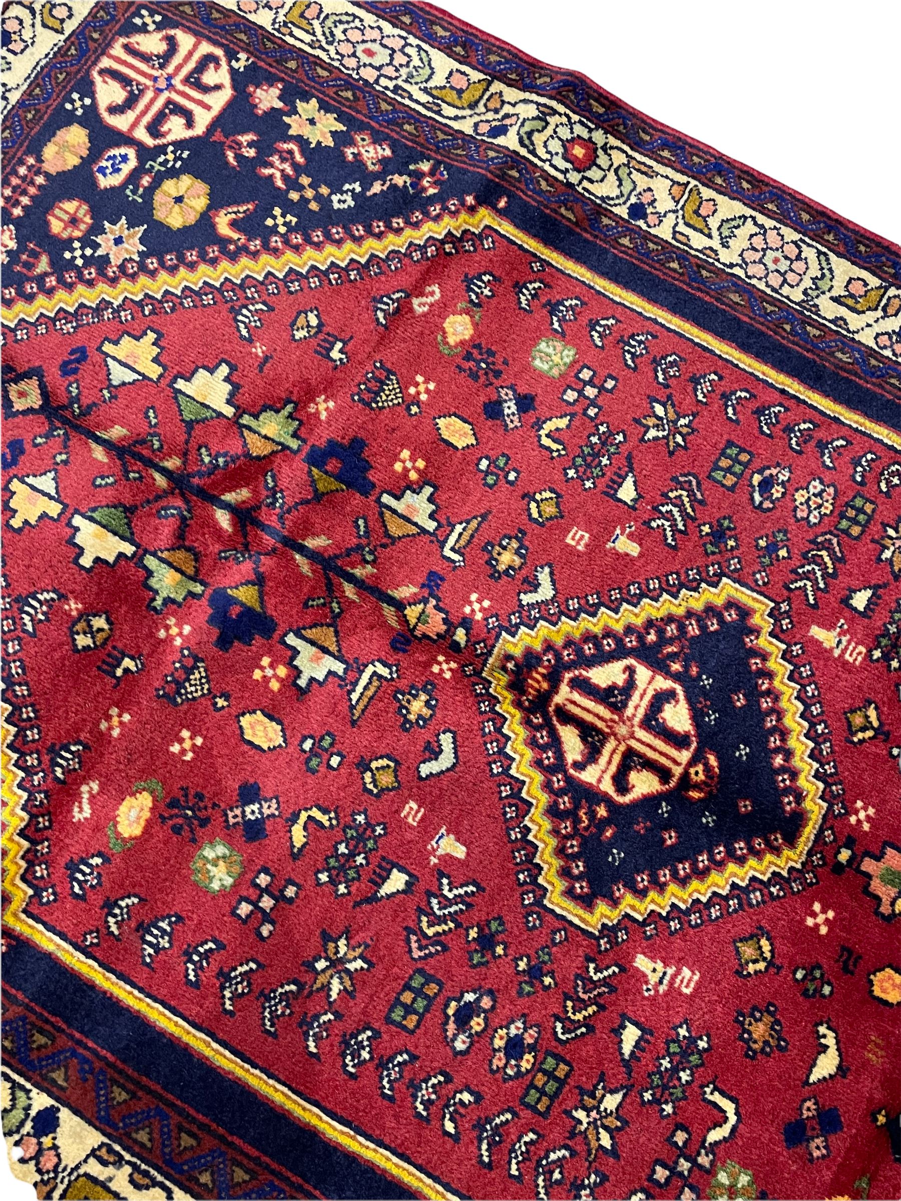 Small Persian Abadeh rug, blue ground with red lozenge field decorated