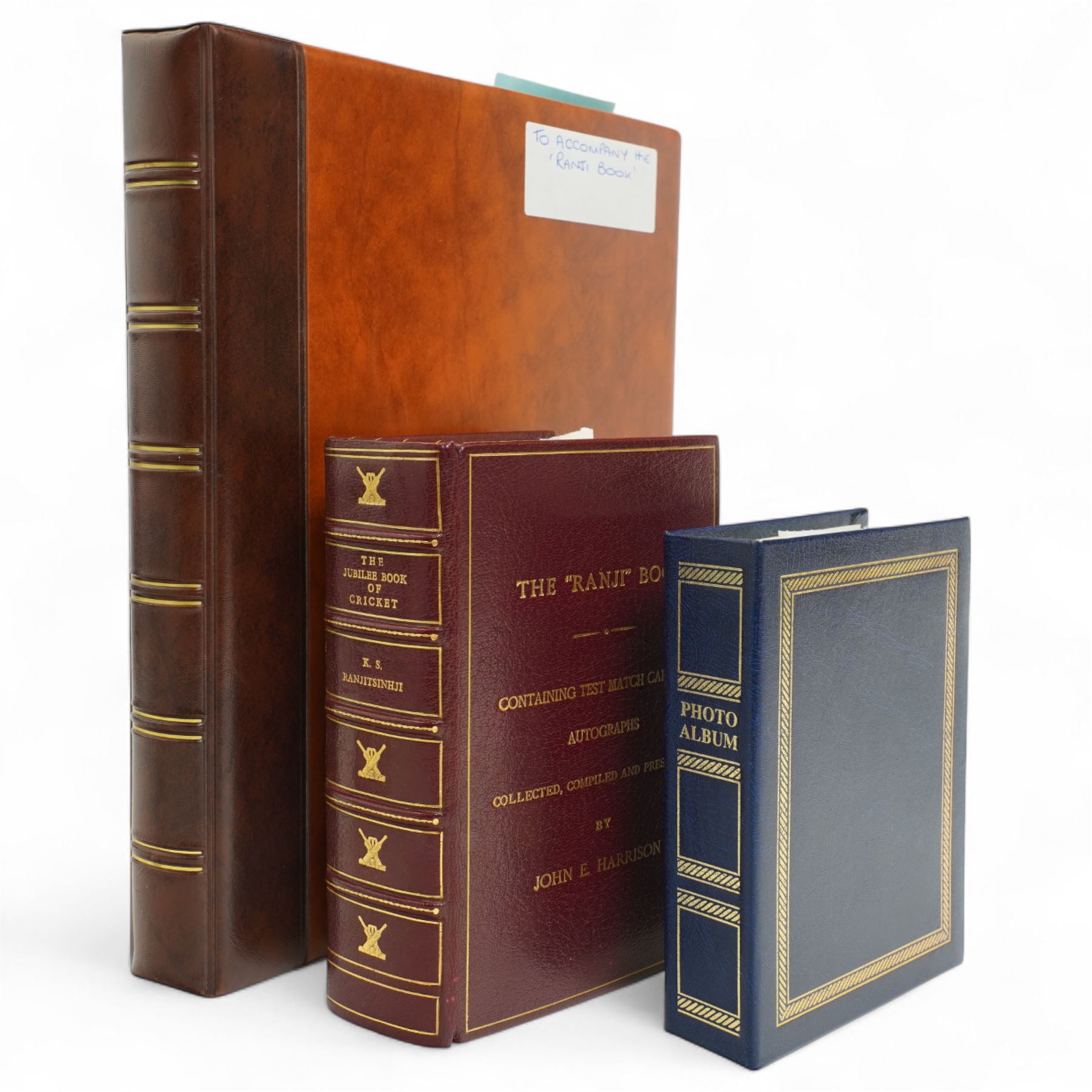 K S Ranjitsinhi - Jubilee Book of Cricket 1897, rebound in full calf and incorporating approximately 250 autographs of international cricketers, collected, compiled and presented by John E Harrison, all edges gilt together with a folder of correspondence, birthday card from Don Bradman, cuttings and autographs etc and a small album of photographs and correspondence