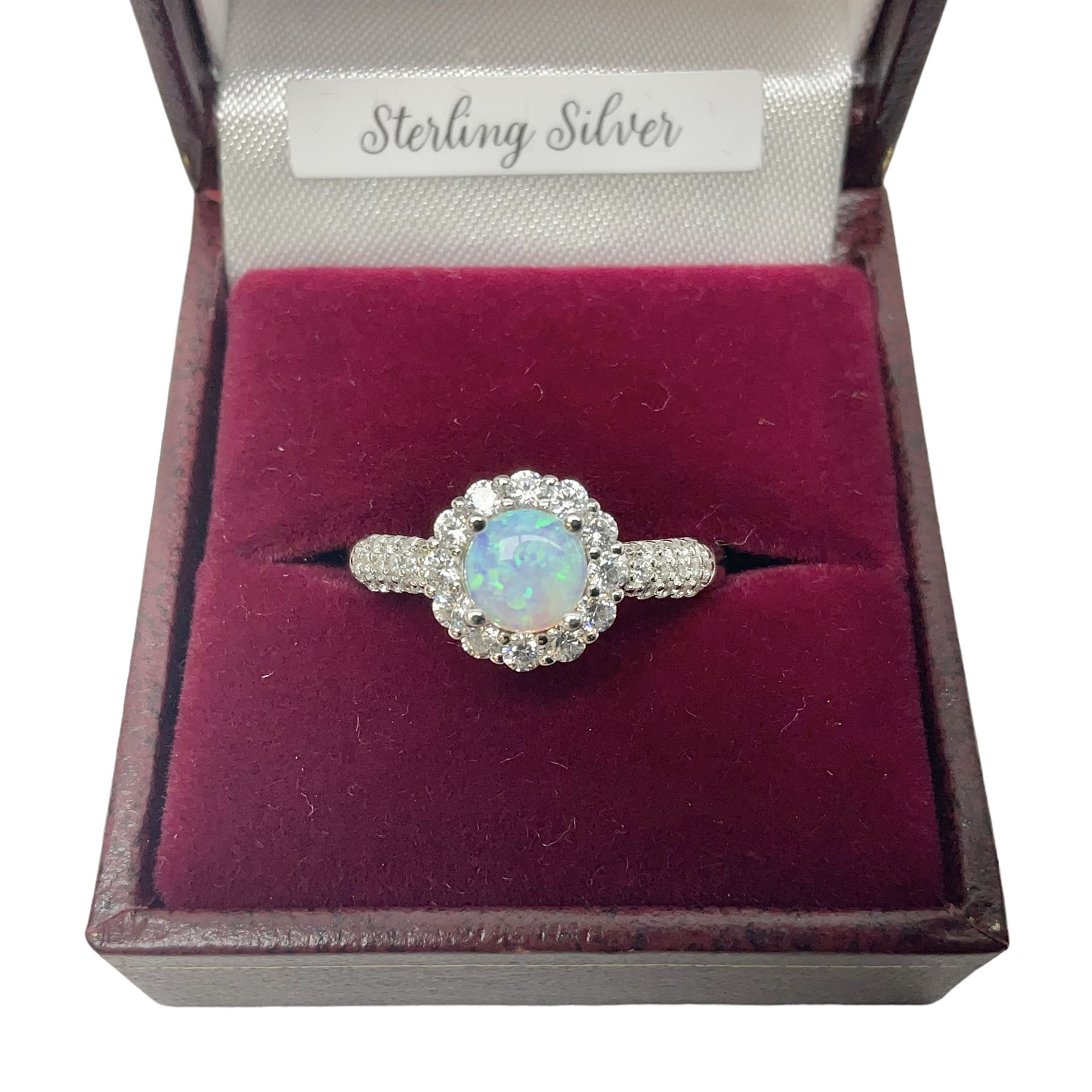 Silver opal and cubic zirconia cluster ring, stamped 925, boxed