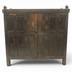 19th century oak hutch cupboard, plank top with moulded cornice and turned finials, panell...