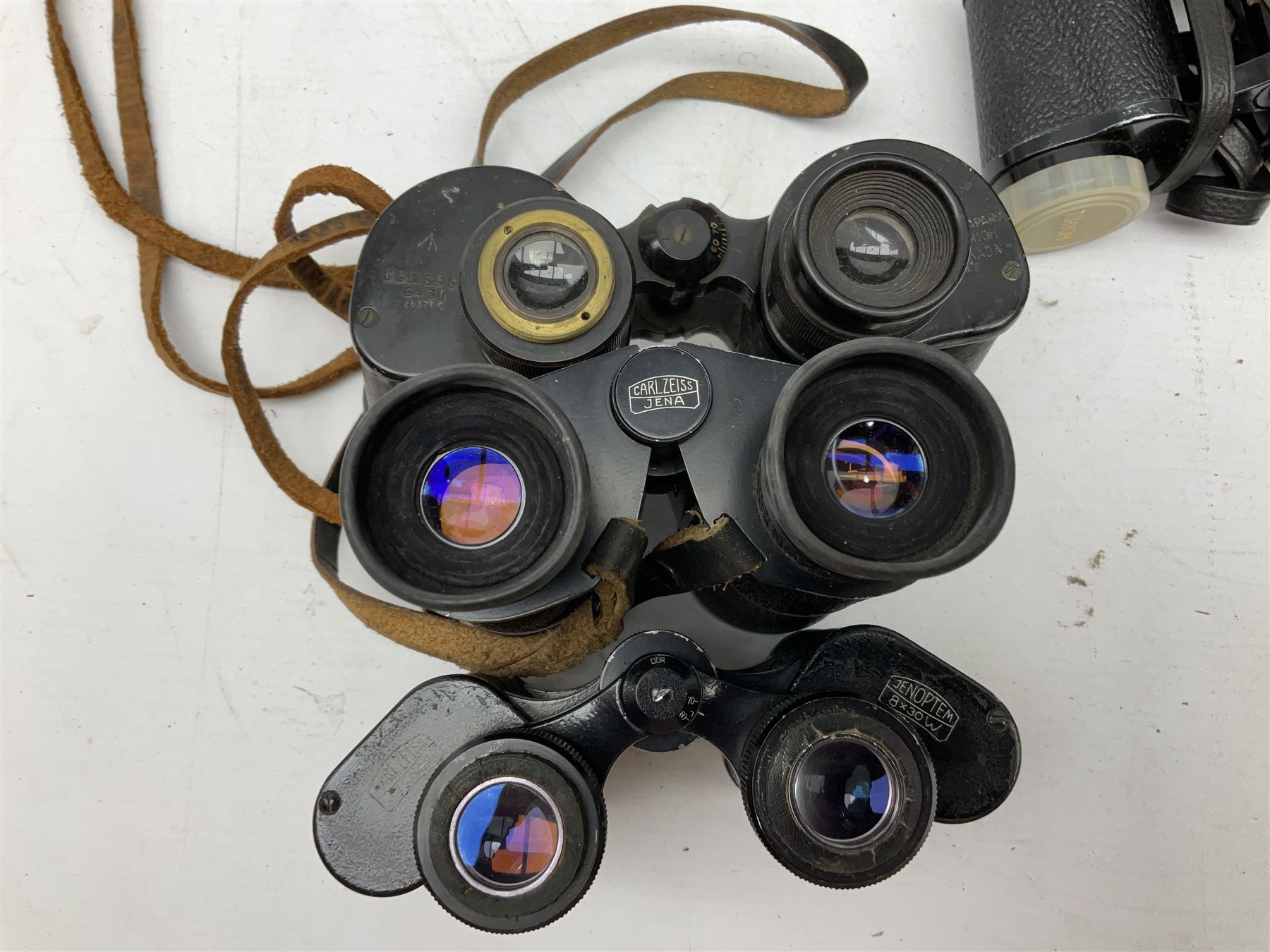 Twelve pairs of binoculars to include BWCF 7x35 Extra Wide Angle, Carl Zeiss Jena Delturis 8x24, Carl Zeiss Jena Jenoptem 8x30W, Chinon Countryman 10x50,  Ajax 8x30, Regent 16x50, etc,  some with cases