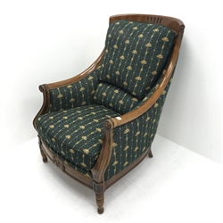 French Empire style beech framed armchair, upholstered in a green studded fabric, turned supports, W78cm