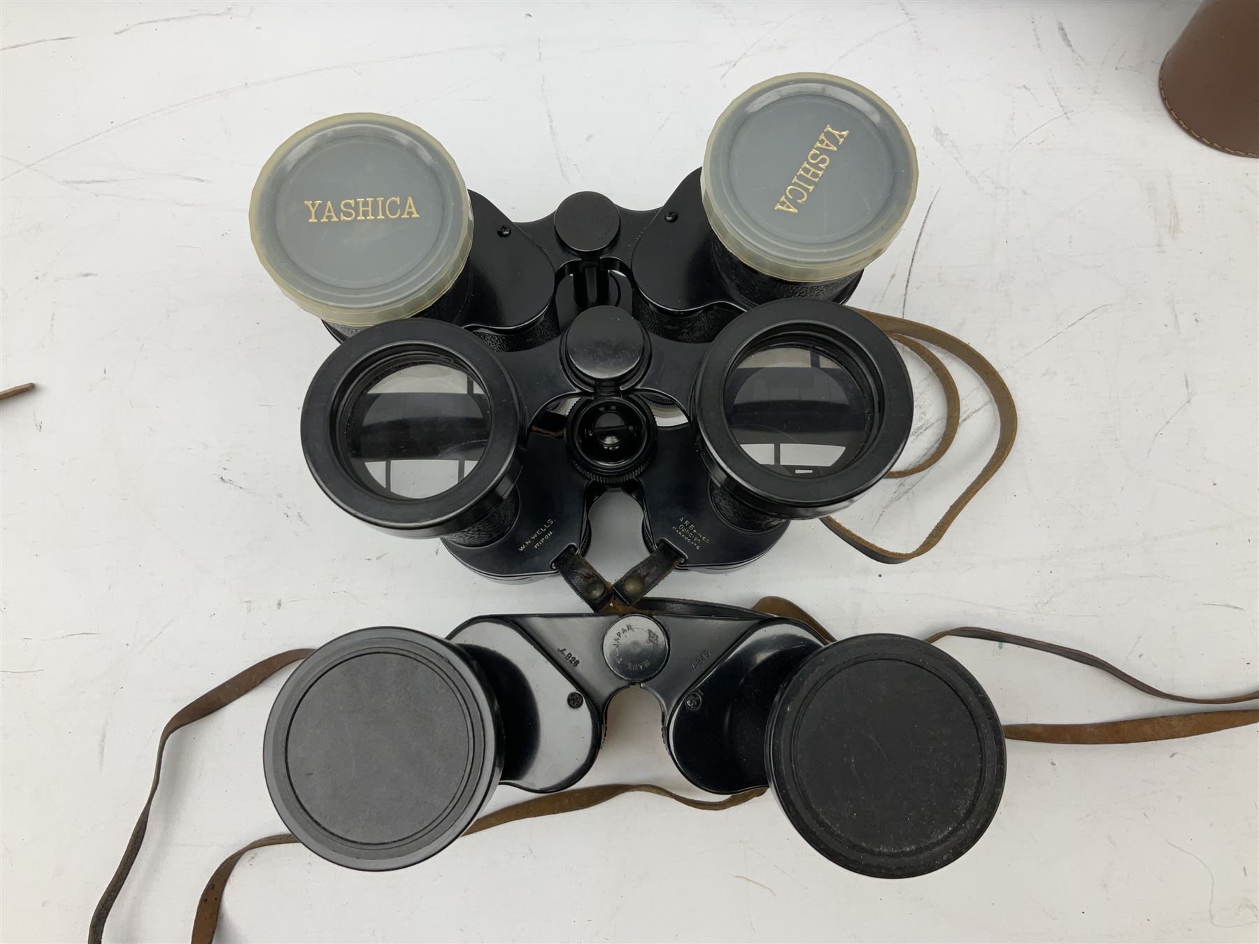 Ten cased pairs of binoculars, to include Rainbow 20x60, Barr & Stroud 7x, Yashica 7x50, Ross London Stepmur 10x50, Wray London Defiant 10x35, Canon 8x30 etc