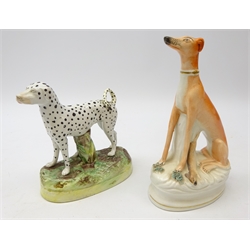  19th century Staffordshire Dalmatian and seated Greyhound, H21cm (2) Provenance: From a Private Yorkshire Collector  