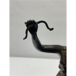Silver plated centrepiece, the stem modelled as Diana disarming Cupid, upon an ebonised wooden base, H36.5cm