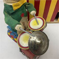 Two Japanese battery operated tin-plate drummers as a plush covered duck and a clown in a felt suit; and small scratch-built painted wooden Punch & Judy show booth with hand operated action (3)