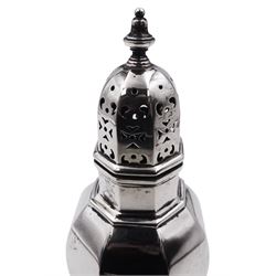 Early 20th century Scottish silver caster, of octagonal faceted baluster form with pierced cover, upon a conforming octagonal stepped foot, hallmarked Hamilton & Inches, Edinburgh 1910, H16cm, approximate weight 4.58 ozt (142.6 grams)