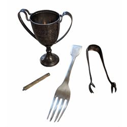 Group of silver, to include trophy, fork, toothpick and tongs