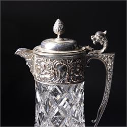 Square glass scent flask with silver collar and facet cut stopper Birmingham 1990, another and a glass claret jug with plated mounts